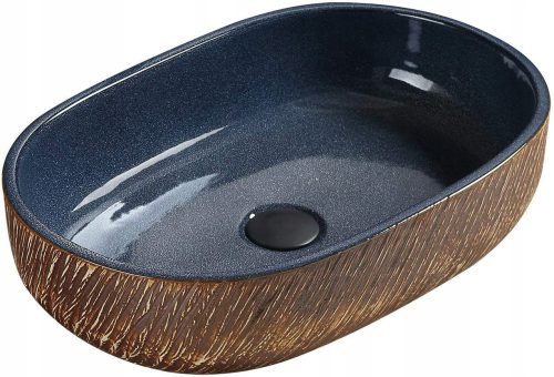 Nadgradni umivaonik Mexen Aleta s ovalnim oblikom i mornarsko plavim uzorkom je elegantan dodatak vašoj kupaonici. Ovaj umivaonik dimenzija 59x40 cm izrađen je od visokokvalitetne keramike sanitarnog 