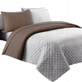   Narzuta dwustrana poliesterska 200x220 cm - Kvalitetni reverzibilni pokrivač za krevet koji donosi udobnost i stil u vaš dom. Ova pikirana narzuta od poliestera dolazi u više boja, uključujući bež, cr